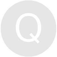 A large, light gray circle on a white background, containing a capital letter "Q" in the center. Reminiscent of an insurance glossary entry, the overall design is simple and minimalist.