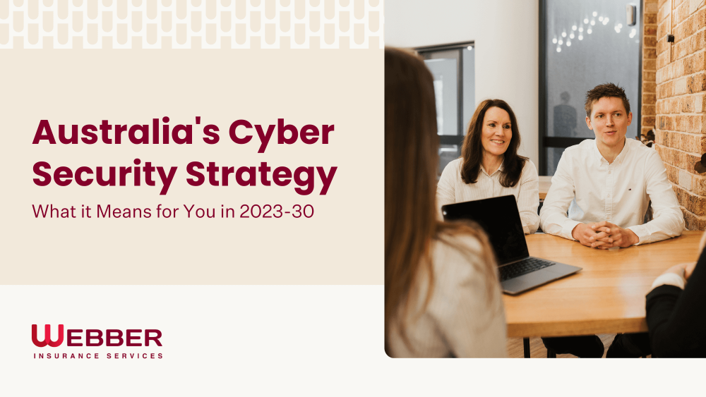 A group of people in a meeting room discussing a presentation titled "Australia's Cyber Security Strategy: What it Means for You in 2023-30" during an active cyber insurance webinar. The background includes the logo and name of Webber Insurance Services.