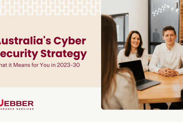 A group of people in a meeting room discussing a presentation titled "Australia's Cyber Security Strategy: What it Means for You in 2023-30" during an active cyber insurance webinar. The background includes the logo and name of Webber Insurance Services.