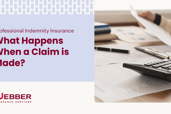 An image with a banner for Webber Insurance Services. The banner reads "Professional Indemnity Insurance: What Happens When a Claim is Made?" The image includes a close-up of a person using a calculator and reviewing documents on a desk.